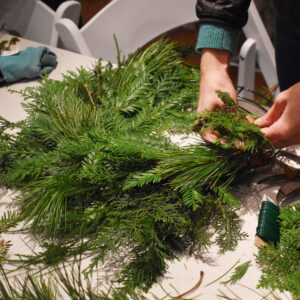 Picture of a person making a wreath.