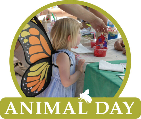 A graphic with a photo of a girl in a butterfly costume and the words Animal Day